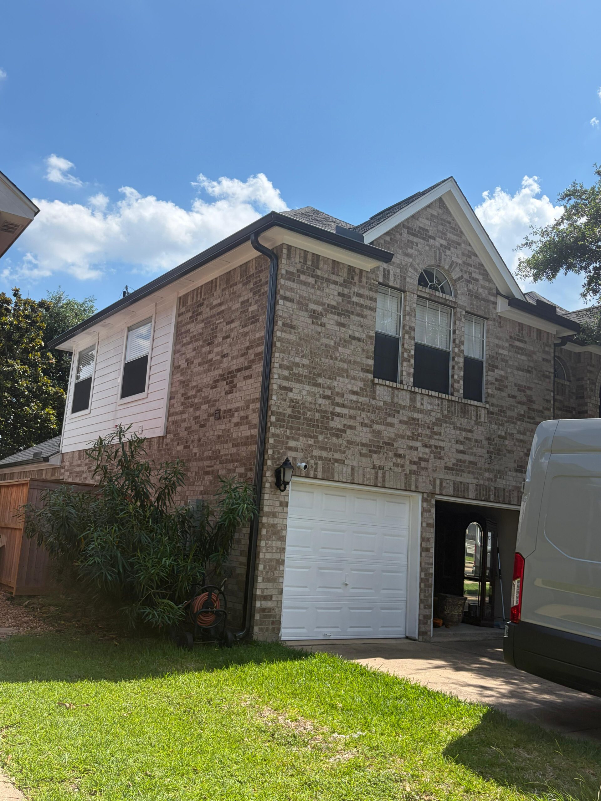 Seamless gutter installation detail on a residential home