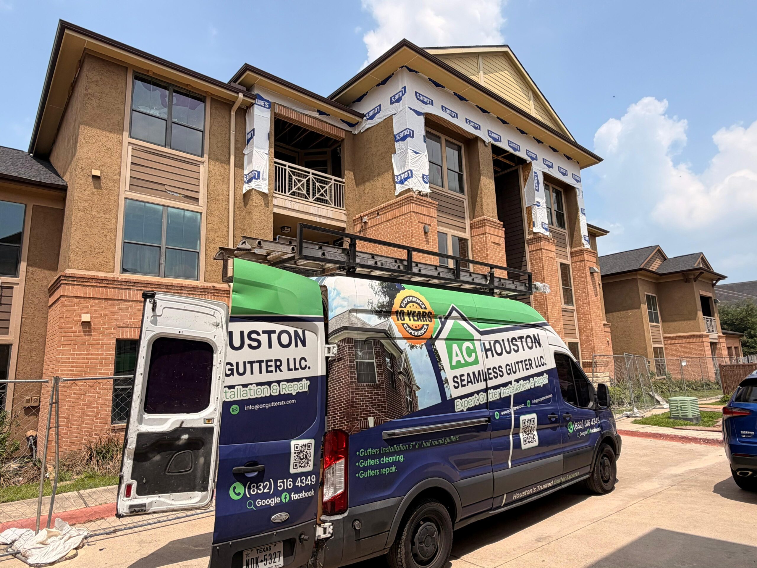 AC Houston service van at a job site