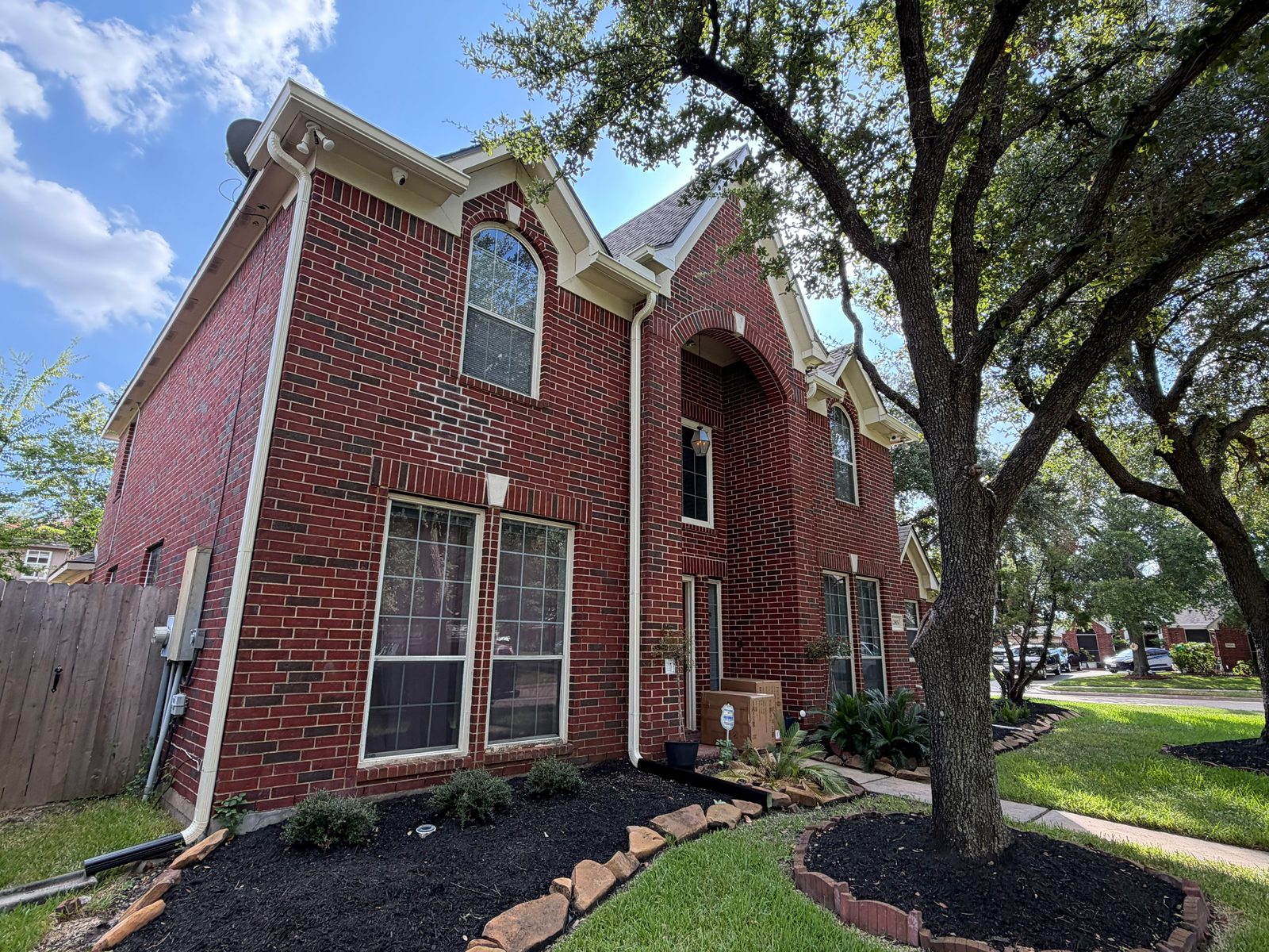 Finished seamless gutters on a Pearland home after installation
